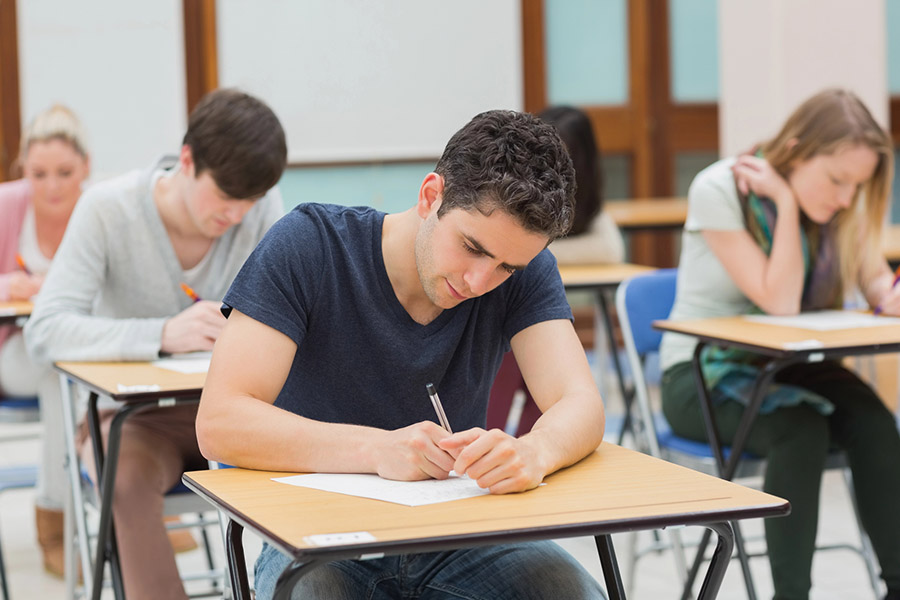 Students taking a test in a classroom in Passadena